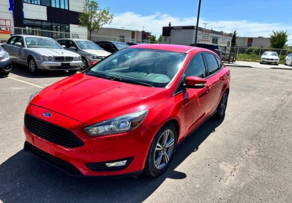 2016 Ford Focus S FWD Red Sedan Front Exterior View Calgary
